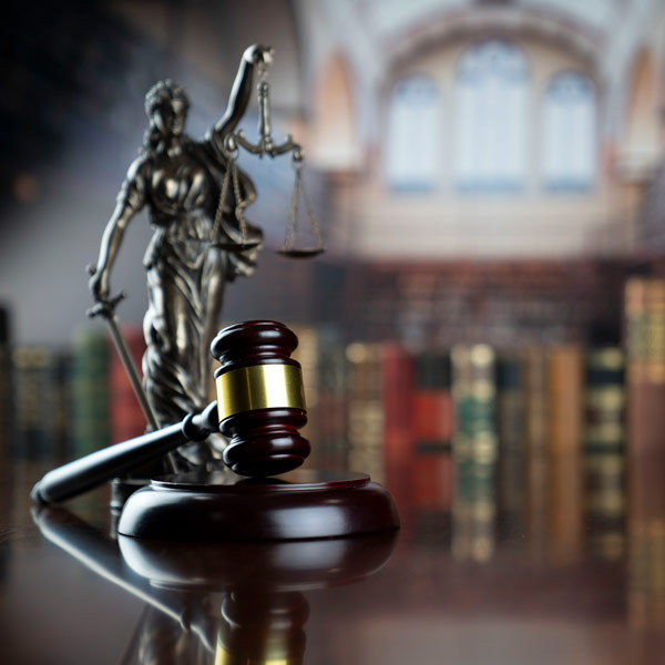 legal scales and gavel with gold accent